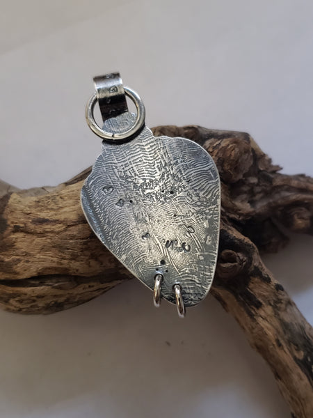 "Buttoned-up" Heart Pendant